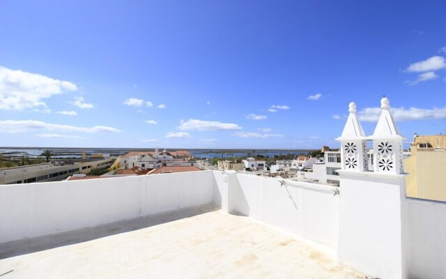 Faro River View by Homing