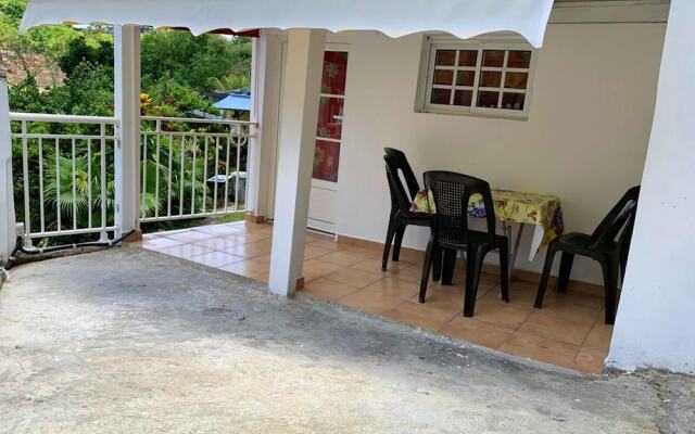 House with One Bedroom in Le Gosier, with Wonderful Mountain View, Enclosed Garden And Wifi - 10 Km From the Beach