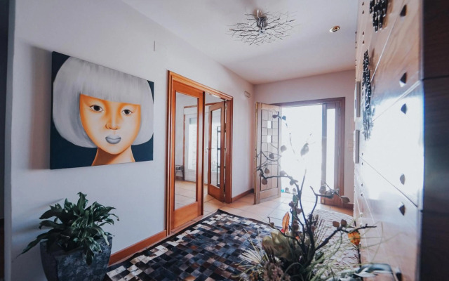 Villa con piscina a pie de playa