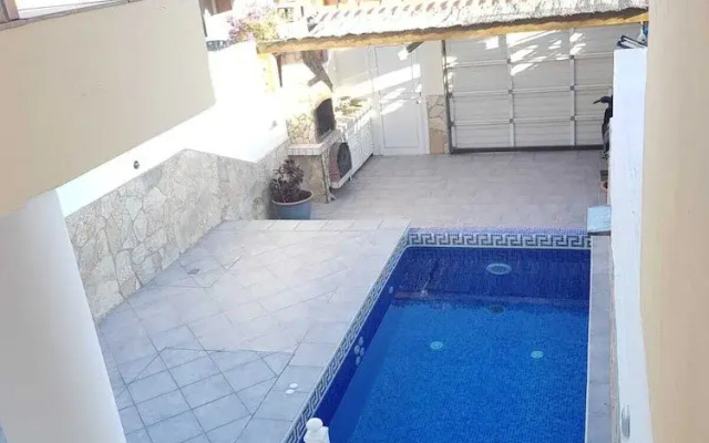 Apartment With Swimming Pool Near the Beach