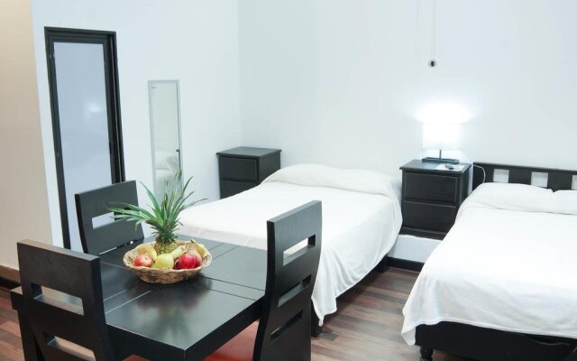 Garcias Suites & Hotel