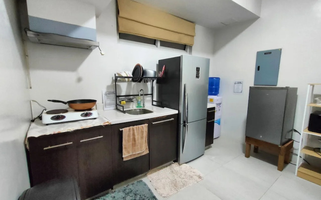 Dr Calayan's 2BR Condo at Pico De Loro