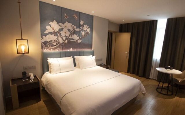 Magnotel Hotel (Dongxing Guomen Port)