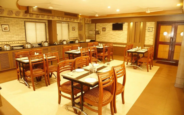 Capital O 37664 Hotel Grand Plaza
