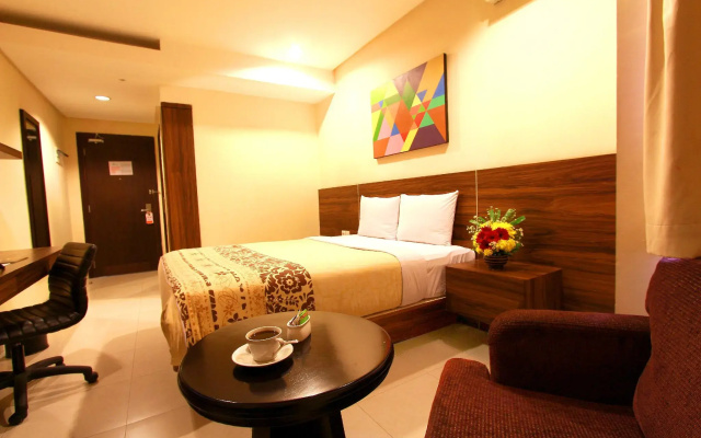 Capital O 203 Prasada Mansion Sudirman