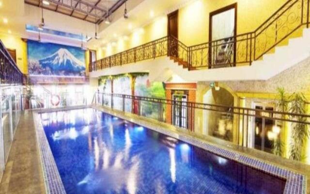 Amos Cozy Hotel & Convention Hall