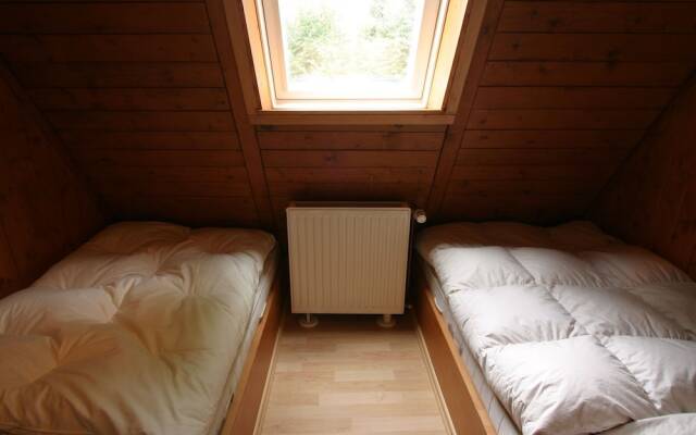 Wooden chalet with oven, in Oberharz near a lake