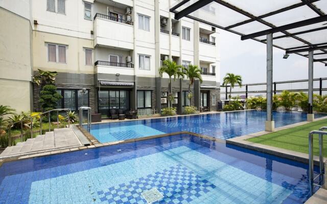 RedDoorz Apartment near Grand City Mall