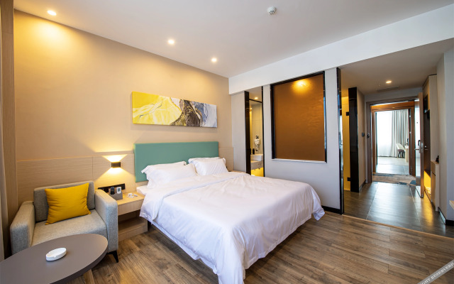 Poltton International Server Apartment(铂顿国际公寓（象州梦幻夜金象路店）)