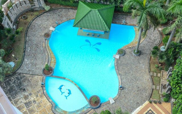 1 Bedroom at Puri Garden Apartment by Travelio