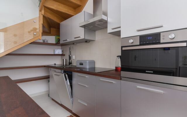 Krakow Two-storey Apartment by Renters