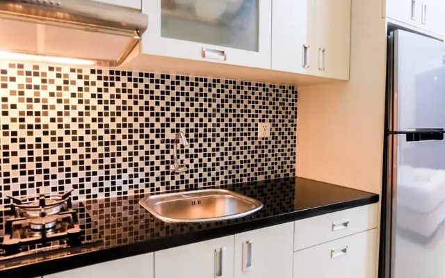 Warm and Homey Studio at The Oasis Cikarang Apartment By Travelio