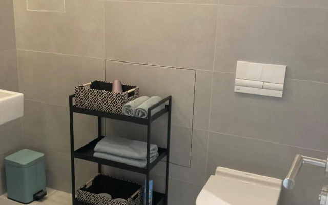 Moderný apartmán/garzónka v centre NR