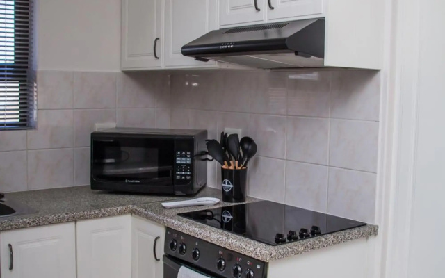 Sunny 2 bedroom apartment in Blouberg Beachfront