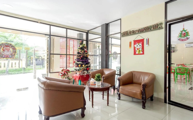Super OYO 283 Helvetia Residence