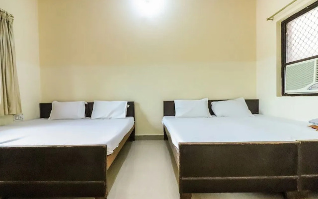 Shri Giriraj Dham by OYO Rooms