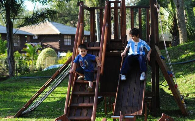 Rio Arriba Suites Apartments y Resto