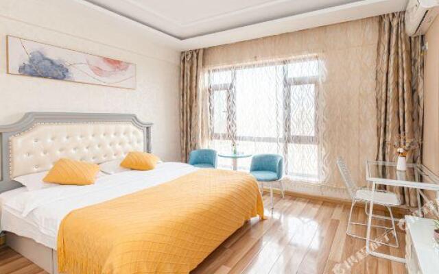 Mango Business Holiday Apartment (Dalian South China Plaza)