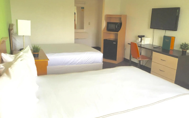 Roomba Inn & Suites Orlando