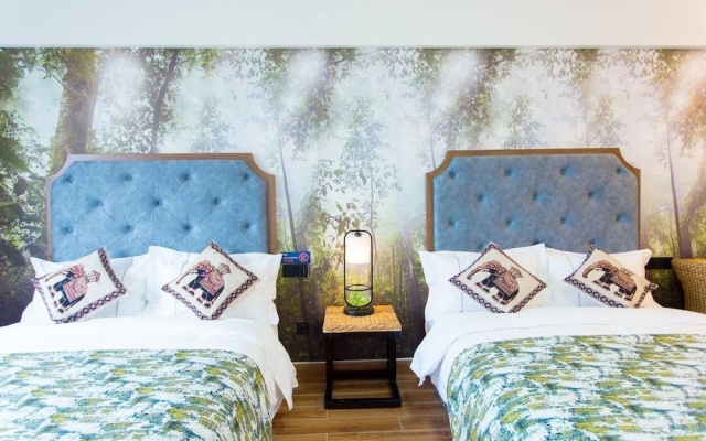 YUMI Apartment-Boshui Sq Branch – Guest Rooms – Xishuangbanna