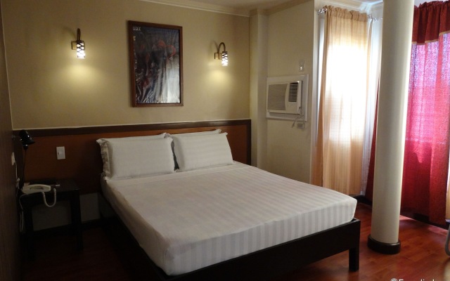 RueMango Apartelle and Suites