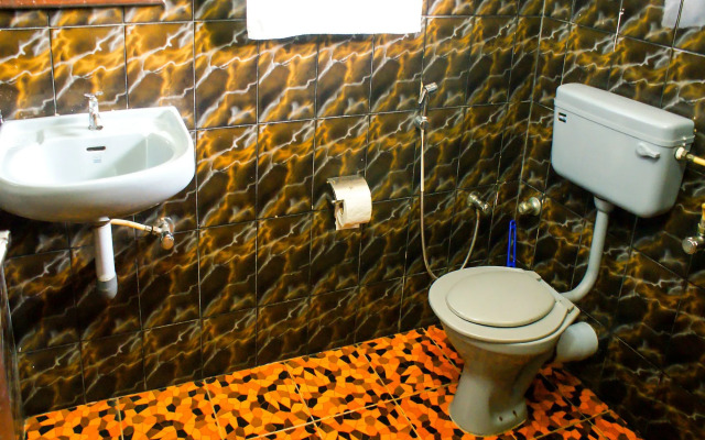 Nedumparambil Residency By OYO Rooms