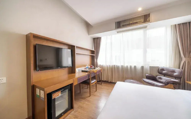 Xingyi Chain Hotel Jiangxia Metro Station