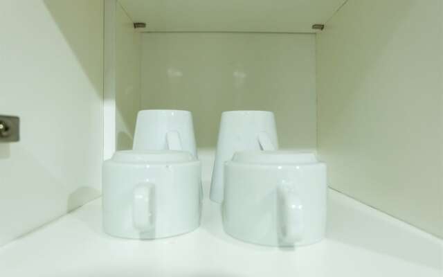 Studio Room Azalea Suites Apartment