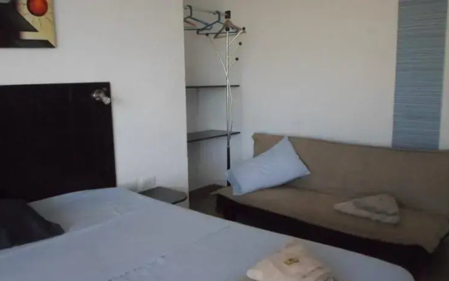 ApartaHotel El Oasis
