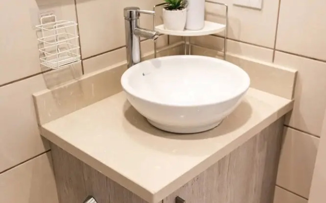 Cozy Condo with Panoramic Hillside Views from Rooftop Terrace and Short Walk to Beach