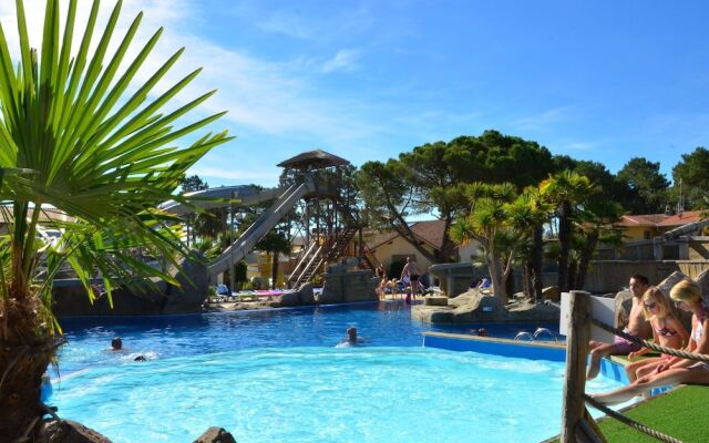 Cozy Mobile Home With Covered Terrace on a Luxury Campsite