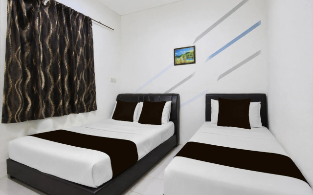 Collection O Langkawi Near Pantai Cenang formerly Tokman Inn – Guest Rooms – Langkawi
