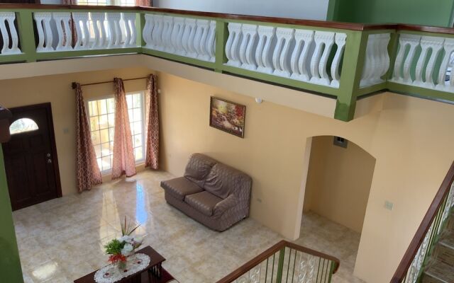 Poinciana House