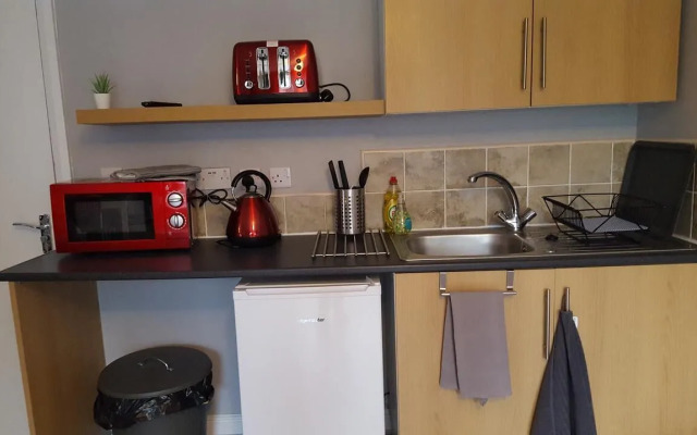 Grey Stone Studio Apartments