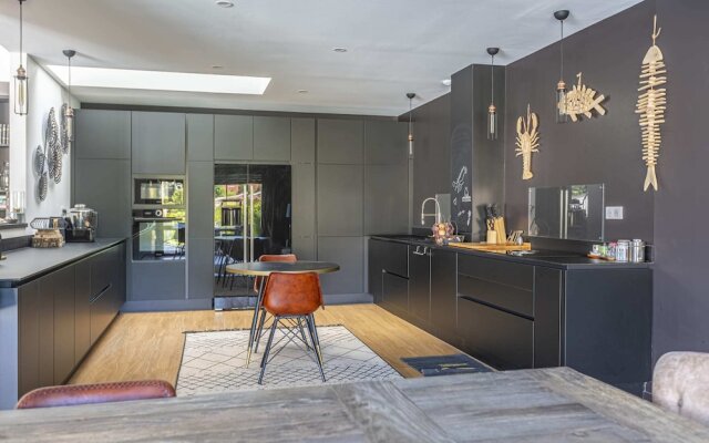Stunning Home with Private Pool and Patio by GuestReady