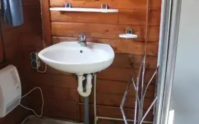 Haus Seerobbe-Blockhaus im Garten