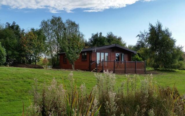 The Log Cabin Glebe Farm