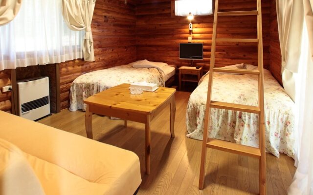 Cottage In Log Cabin