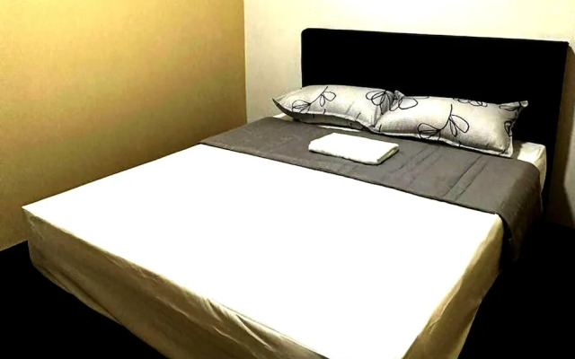 SPOT ON 90777 Aiman Room