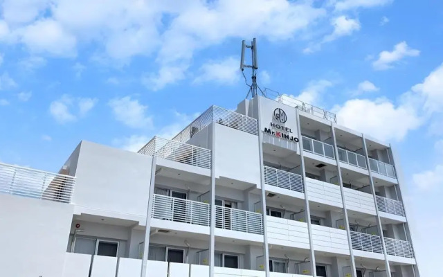 Mr.KINJO in front of Manza Beach