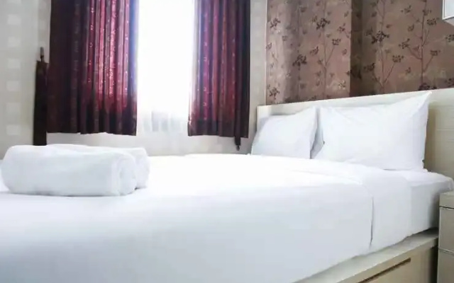 Clean 2BR with Pool View Mutiara Bekasi Apartment By Travelio