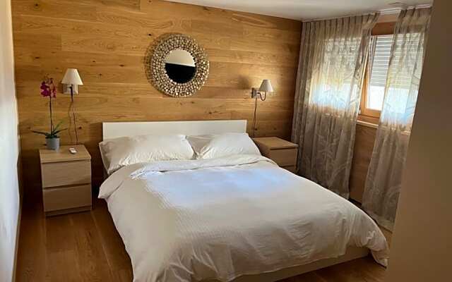 Family suite with garden and amaizing view to Lugano
