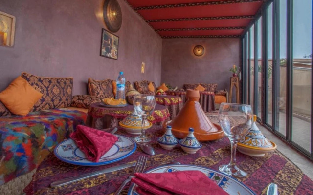 "room in Guest Room - Riad Lakouas Triple Room With Pool View"