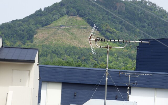 Guesthouse Hyakumanben Cross