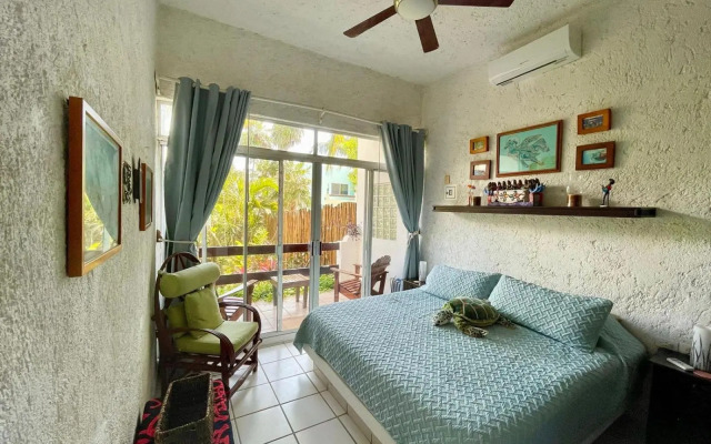 Bttm floor beachfront condo in Half Moon Bay Akumal
