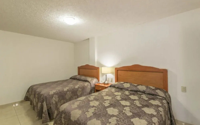 Suites Poliforum Inn