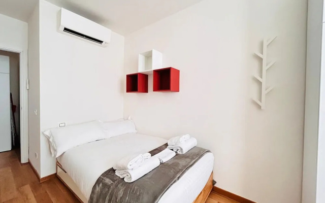 Moderno Bilocale con Terrazzo e Parcheggio