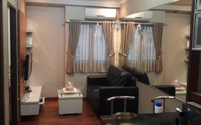 Apartment The Suites Metro by Herlan