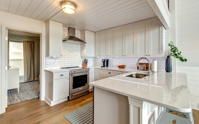 Roomy Chalet-Style Beachfront Condo with Private Beach Access by RedAwning