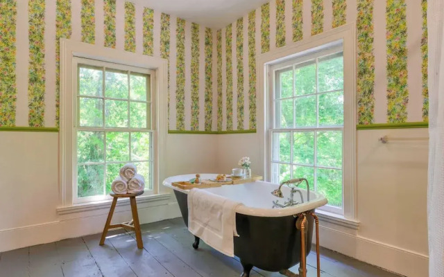 Relax in Style at Historic Modern on Main With Modern Amenities & Wooded Views